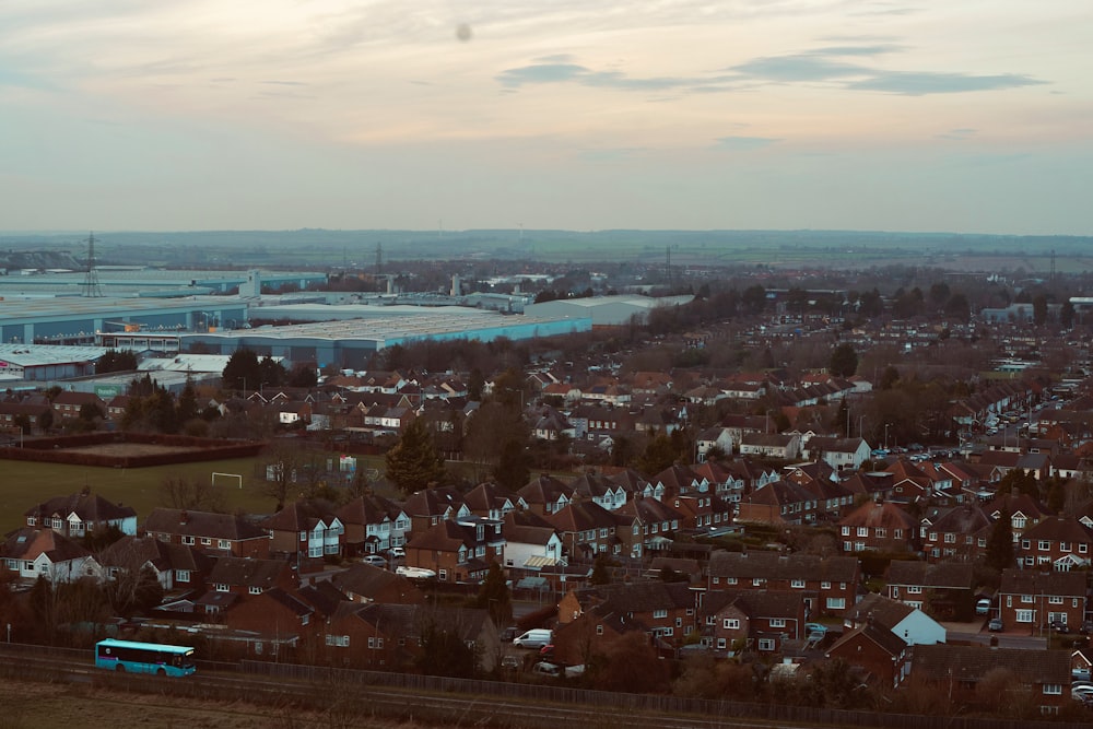 a view of a city with a train on the tracks