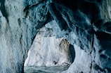 a large cave with water inside of it