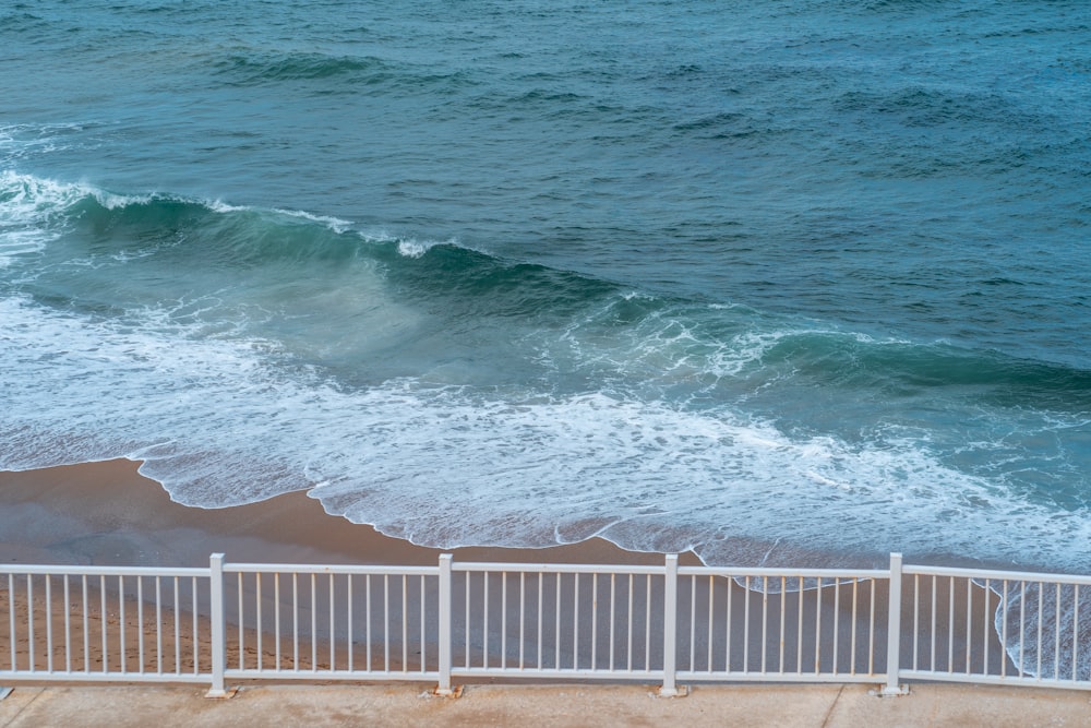 a view of the ocean from the top of a building