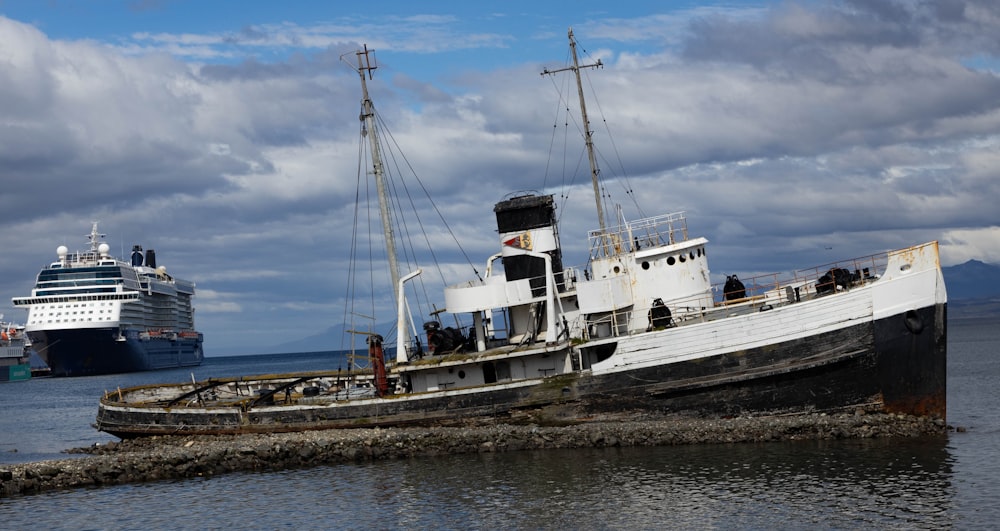 a large boat sitting on top of a body of water