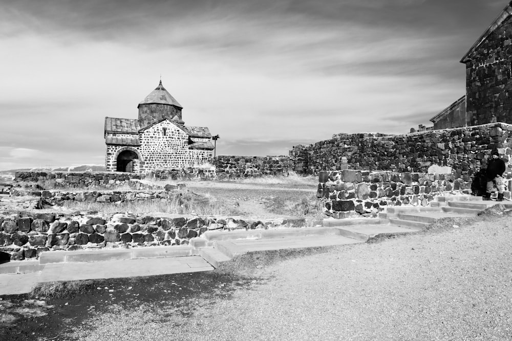 a black and white photo of an old building