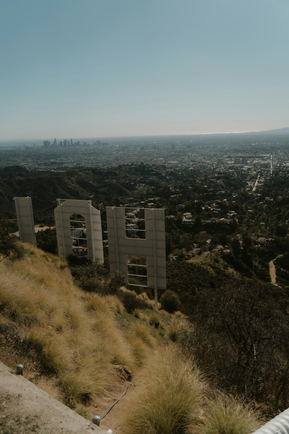 a view of a city from the top of a hill