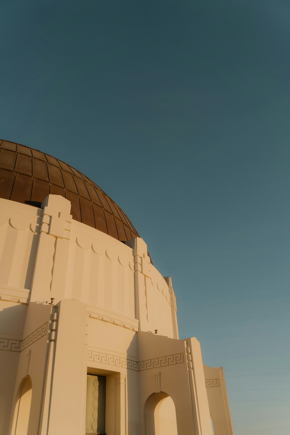 a large white building with a dome on top