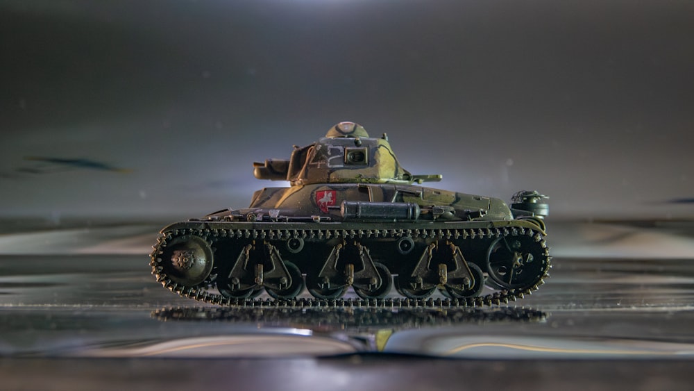 a toy tank sitting on top of a table