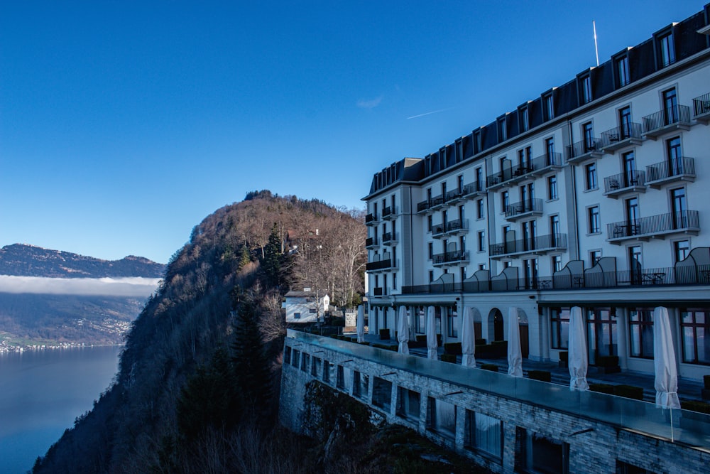 a building on a cliff overlooking a body of water