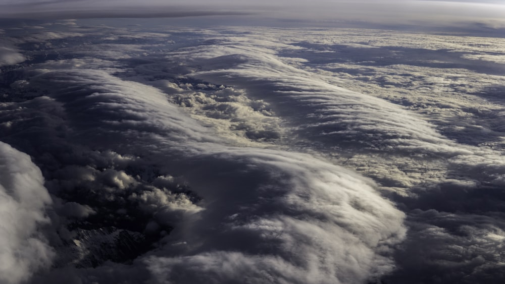 a view of clouds from an airplane window