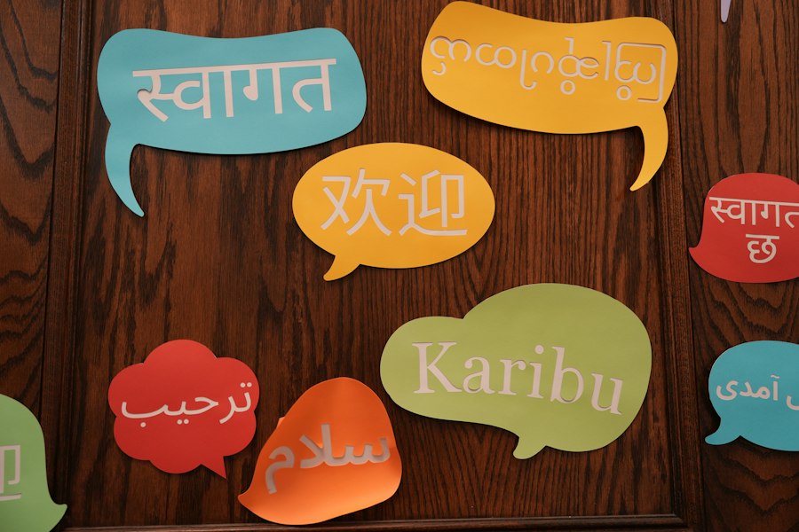 Colourful speech bubbles with welcome messages in different languages