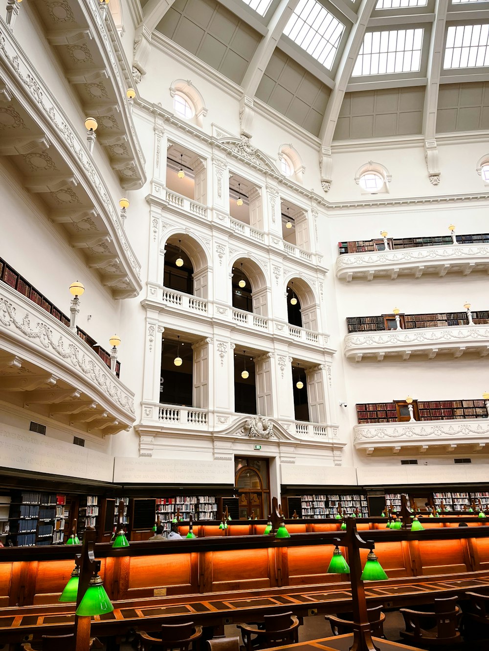 the interior of a large library with many bookshelves