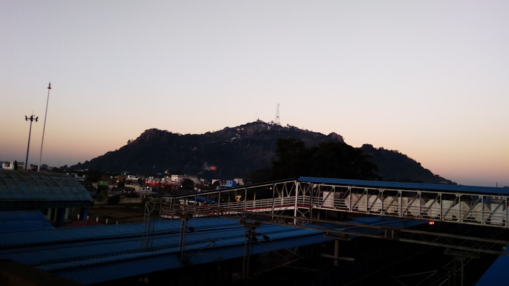 a view of a mountain with a sky background