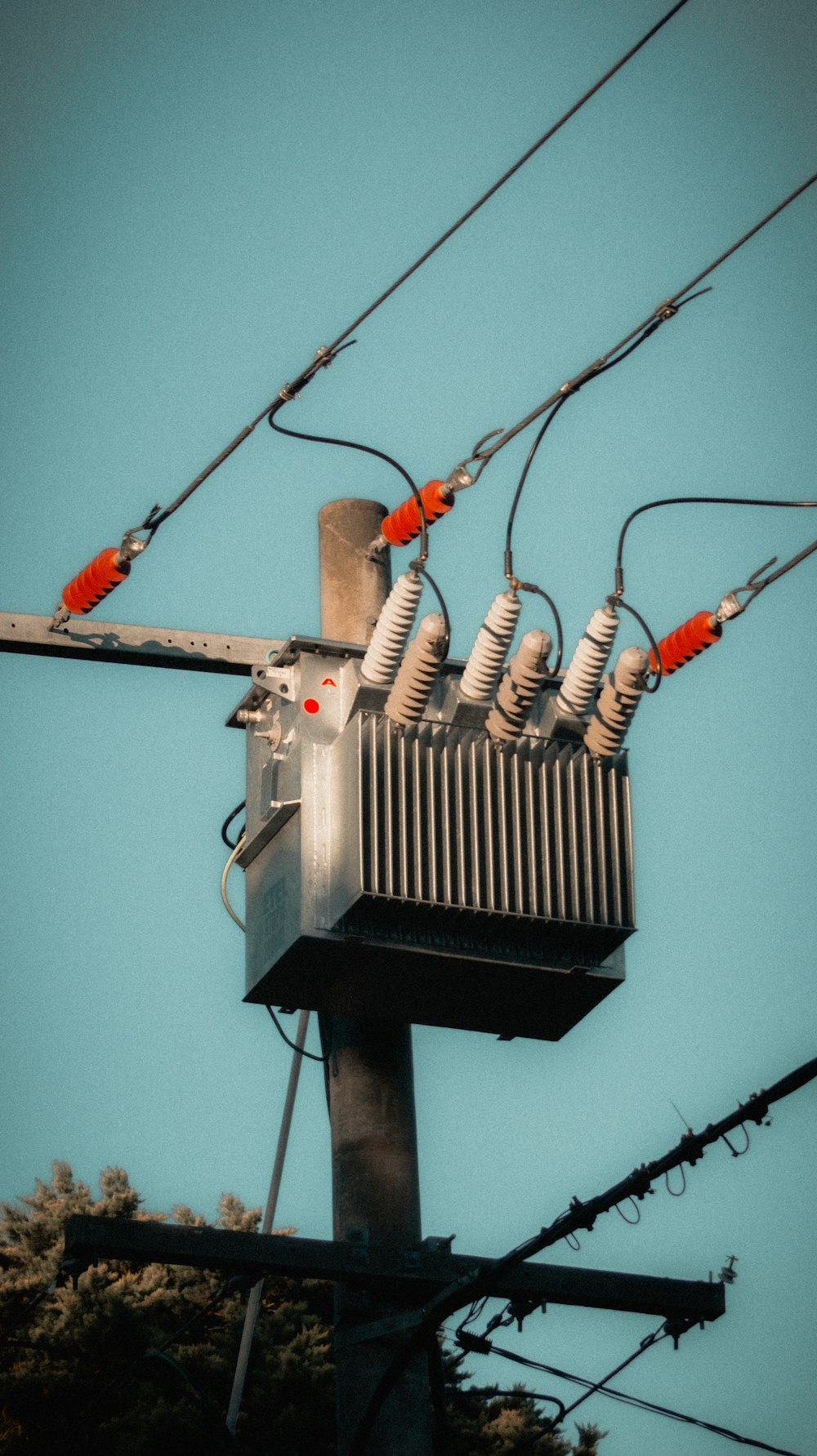 a power pole with a bunch of wires attached to it