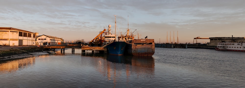 a boat docked at a dock in the water