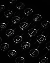 a black and white photo of a typewriter