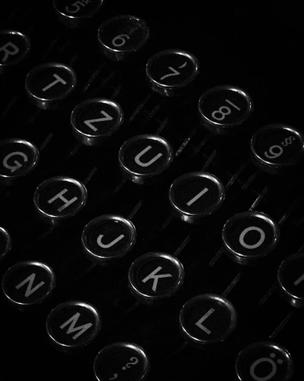 a black and white photo of a typewriter