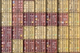 a bunch of cargo containers stacked on top of each other
