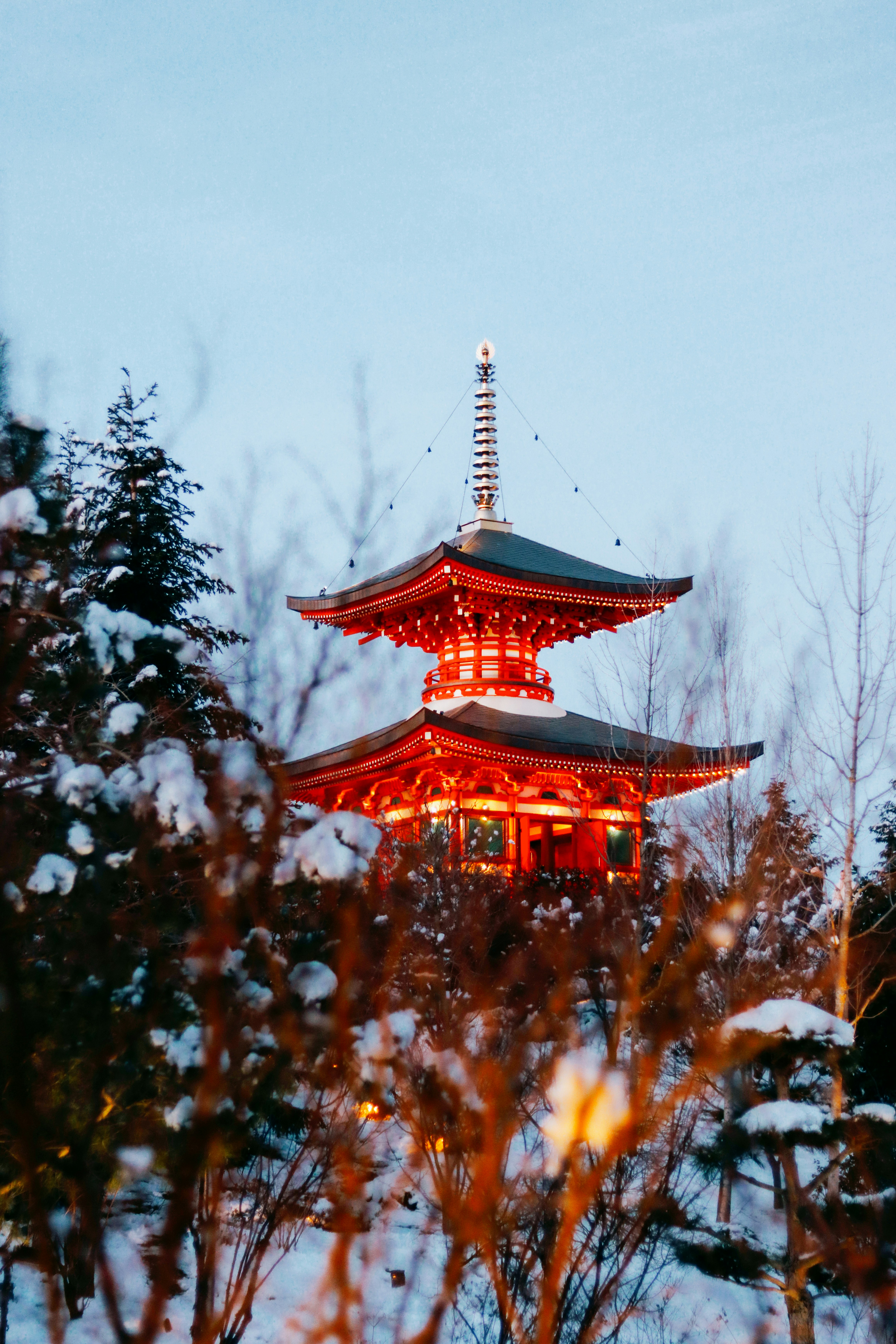 a tall red building with a tower on top of it