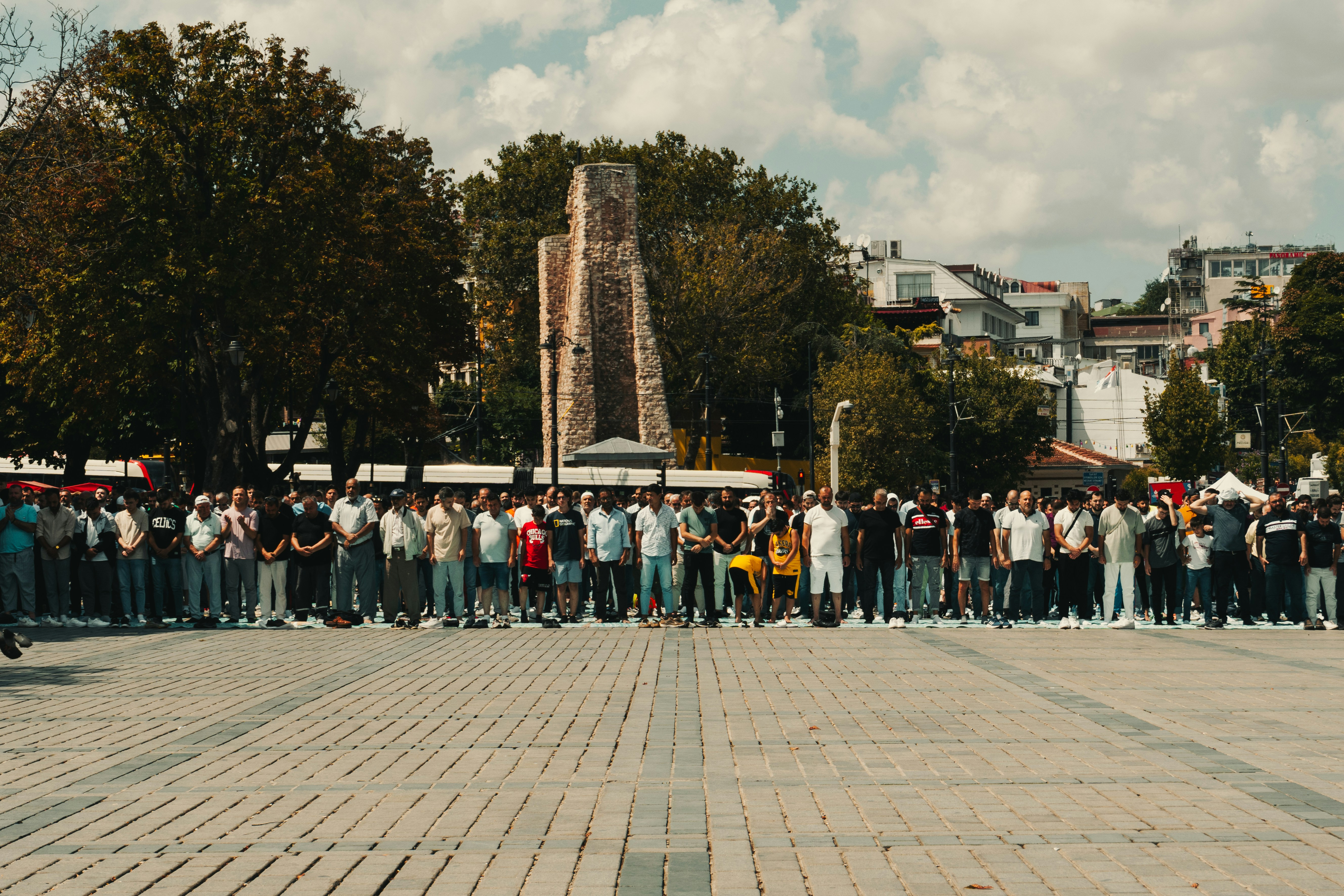 a large group of people standing in a line