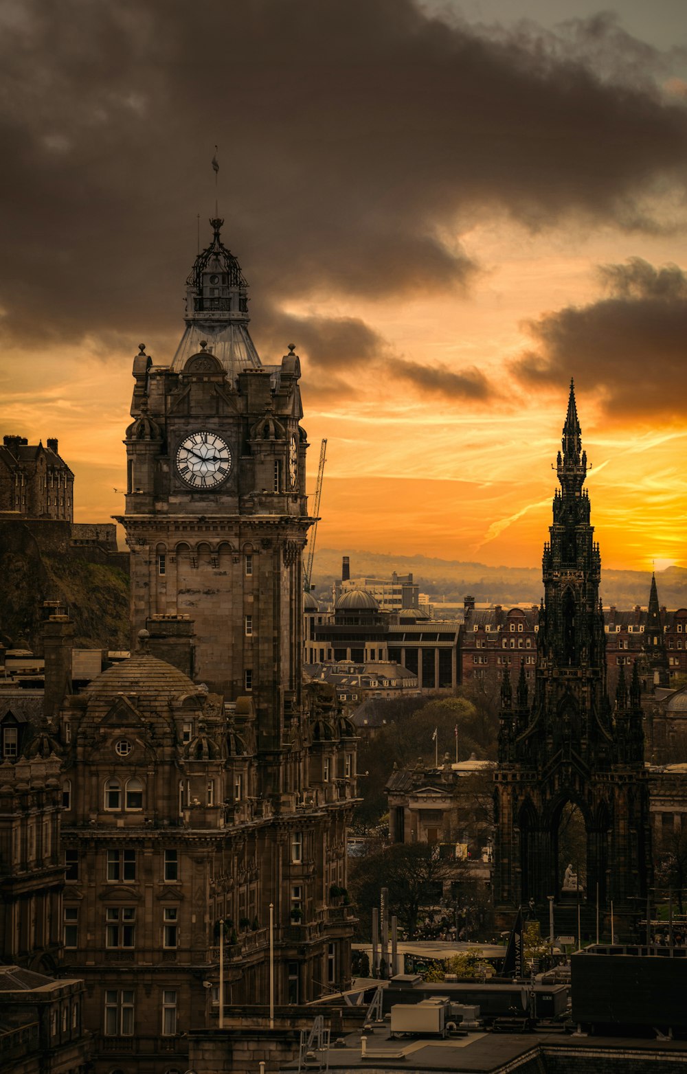 a large clock tower towering over a city