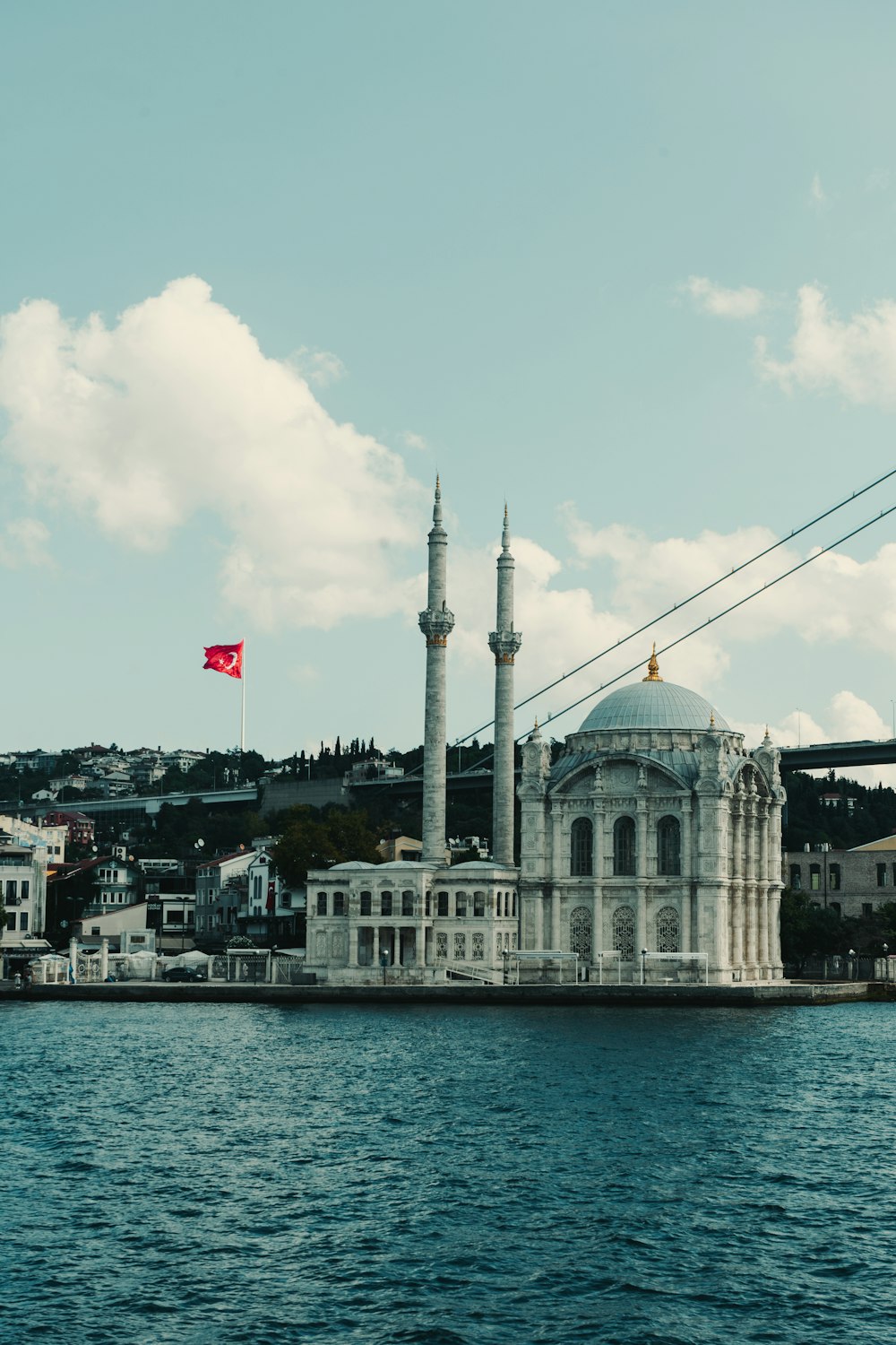 a large building sitting on top of a body of water