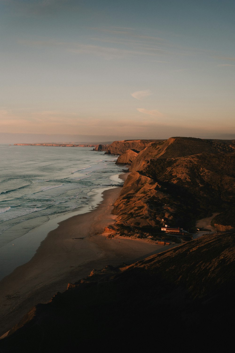 a view of the ocean from a cliff