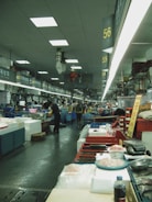 a fish market filled with lots of fish