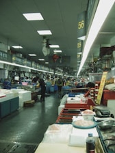 a fish market filled with lots of fish