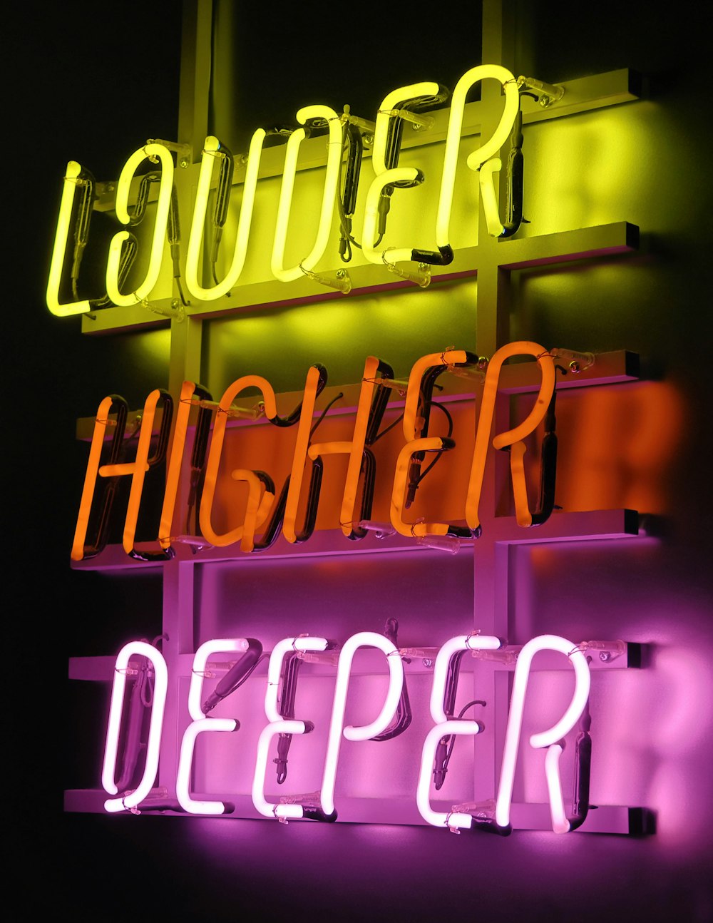 a neon sign that says liquor higher and deeper