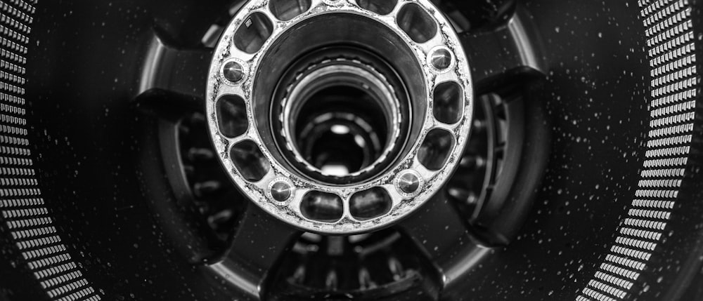 a black and white photo of a wheel