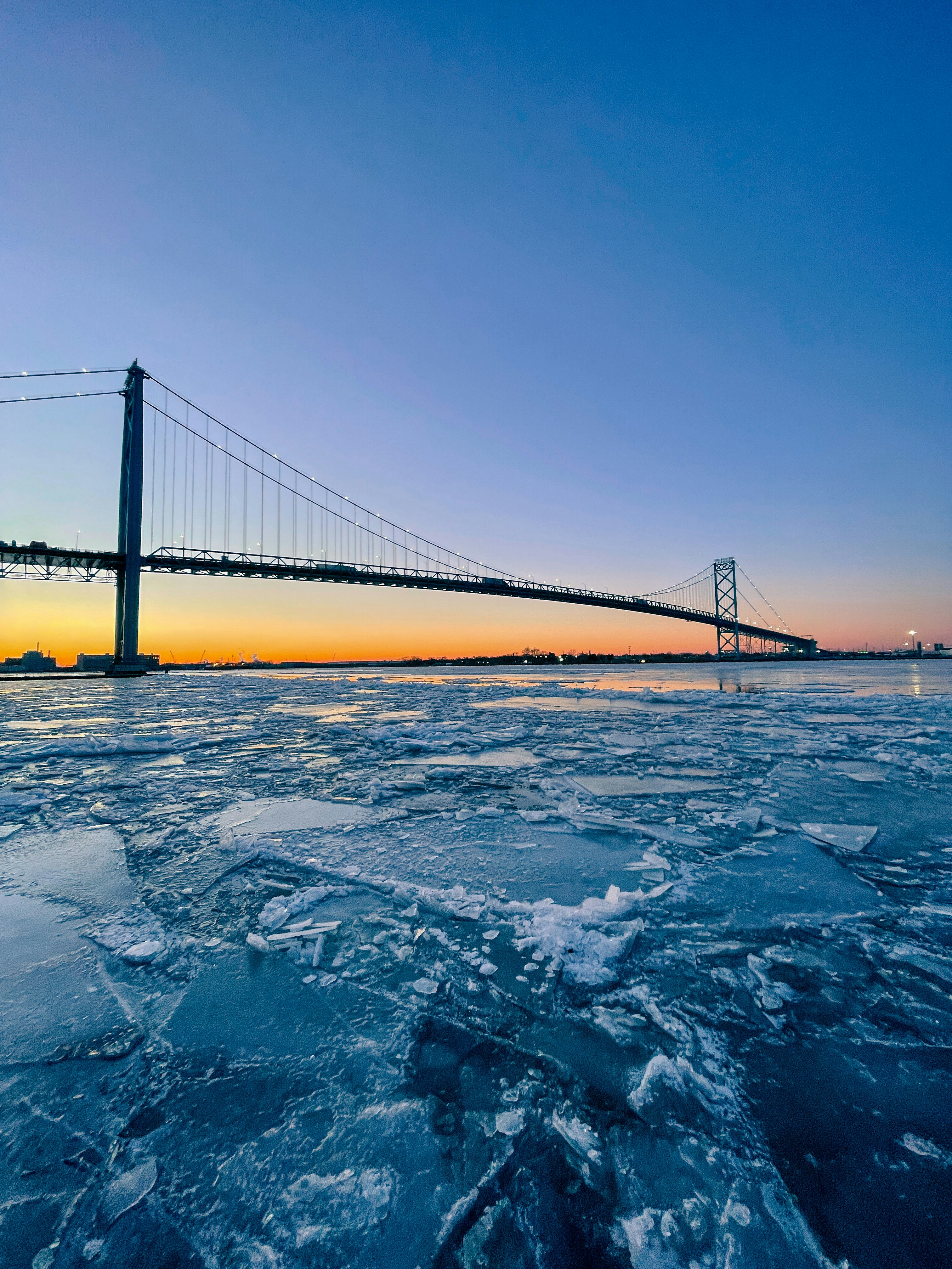 a view of a bridge over a body of water