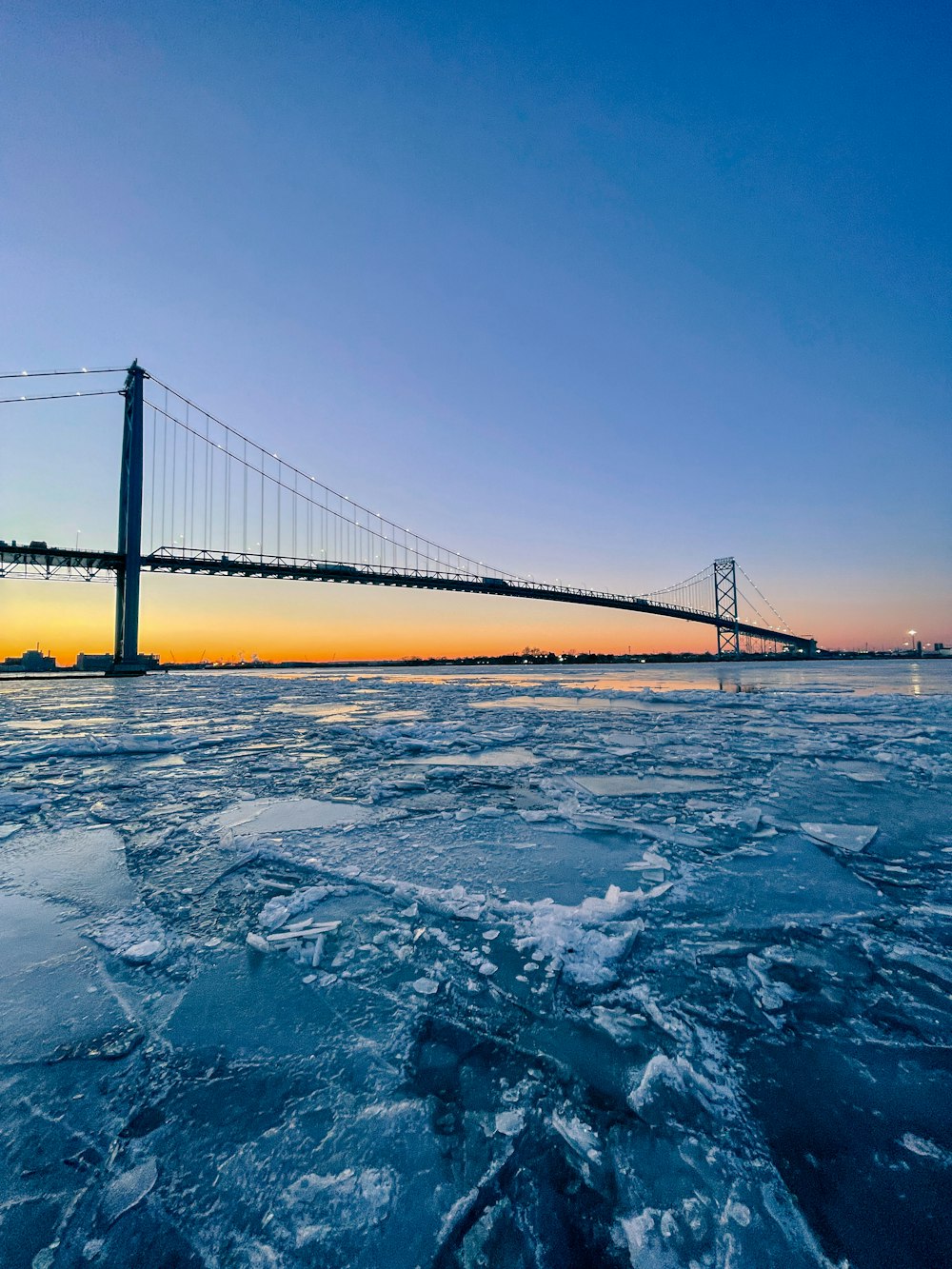 a view of a bridge over a body of water