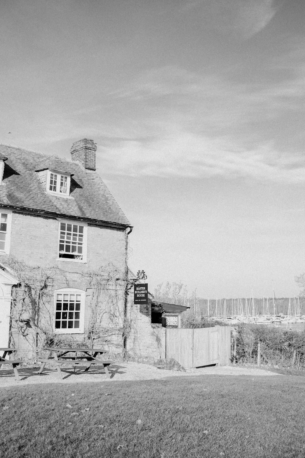 a black and white photo of a house