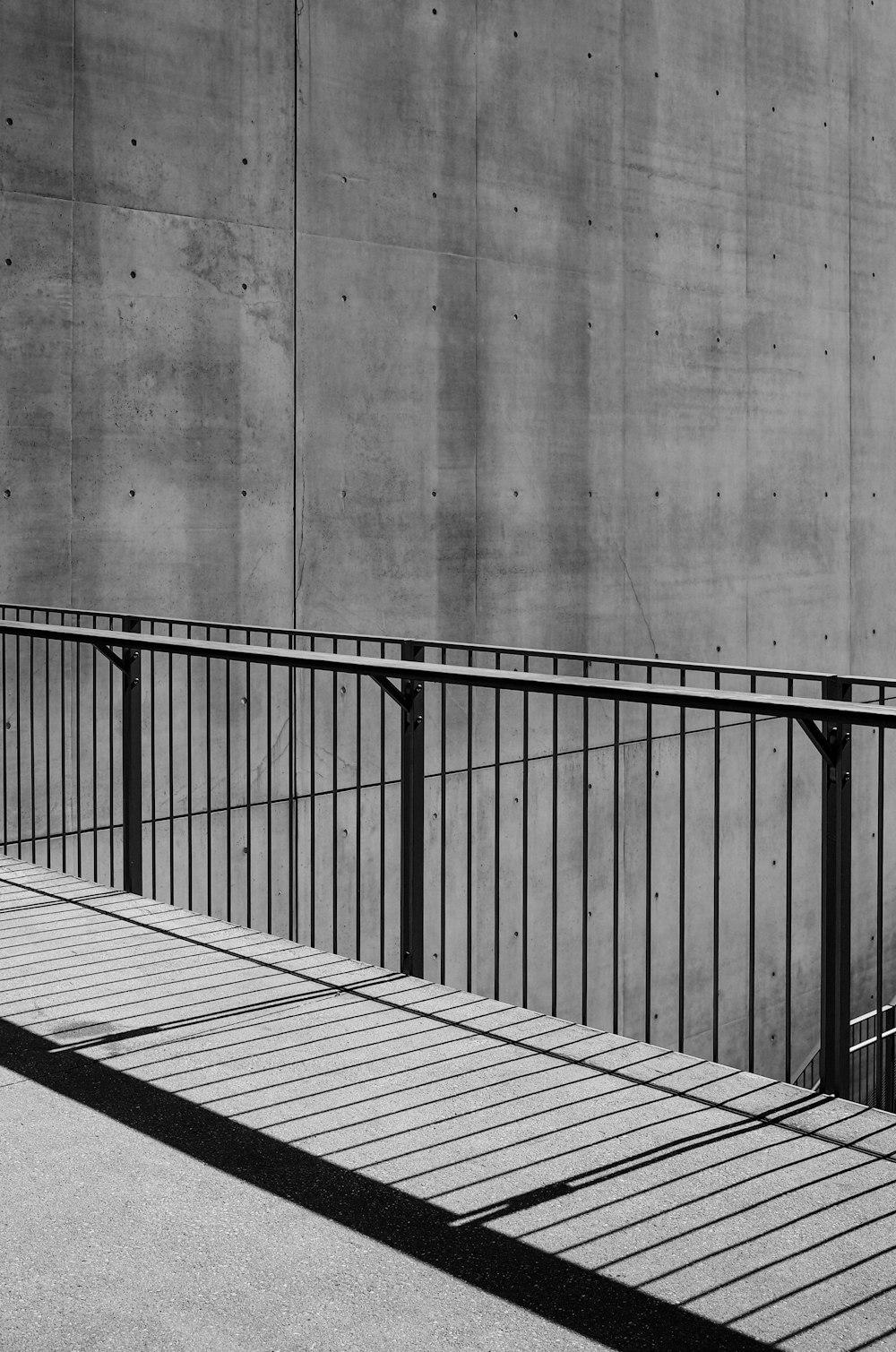 a black and white photo of a person on a skateboard