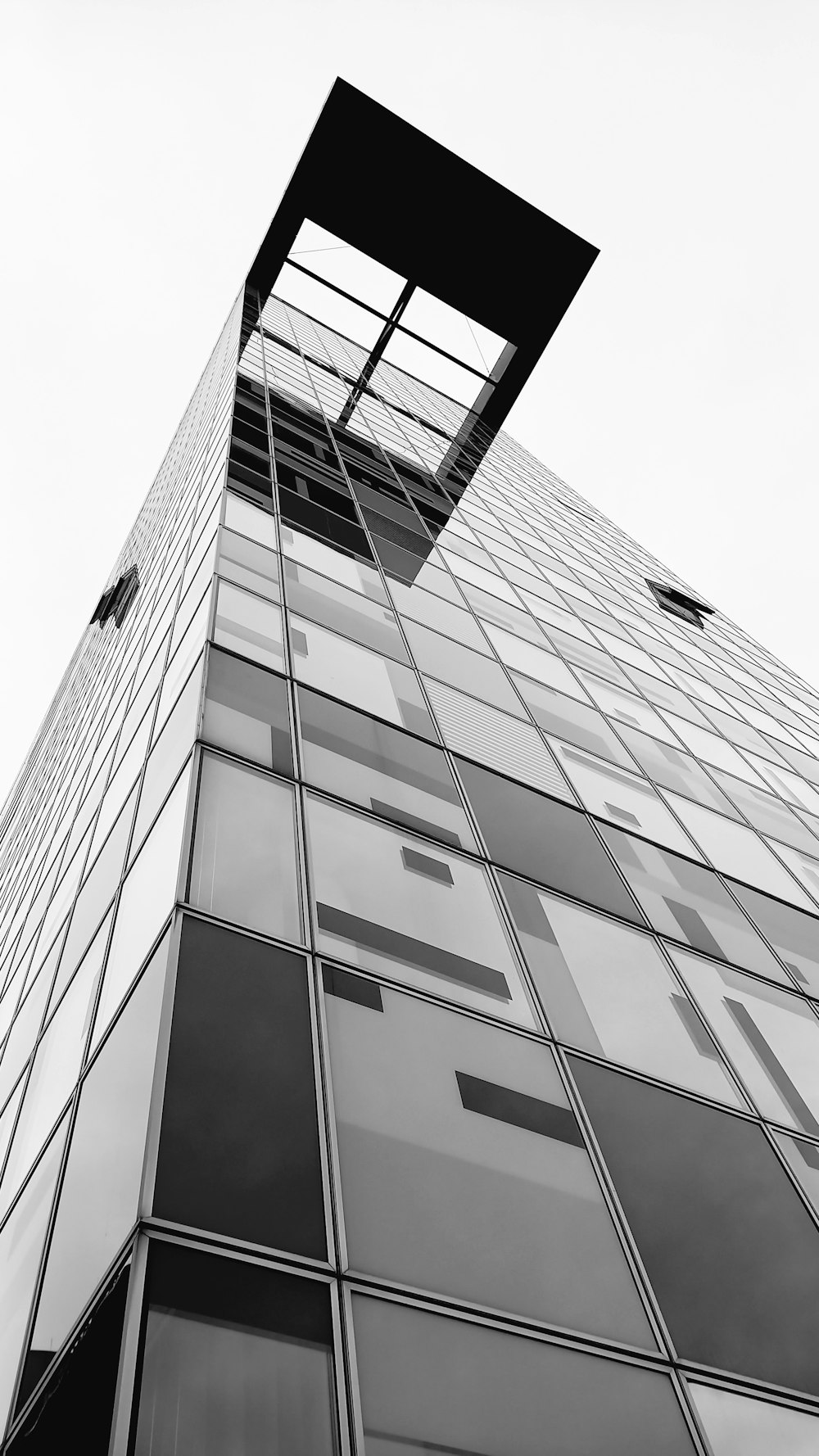 a black and white photo of a tall building