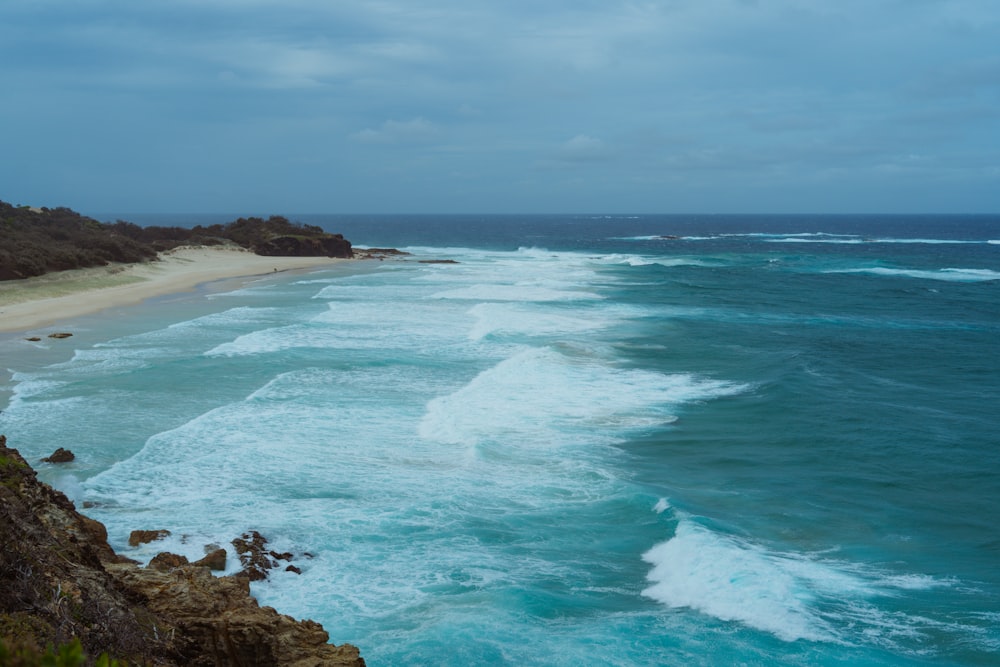 a view of the ocean from a cliff