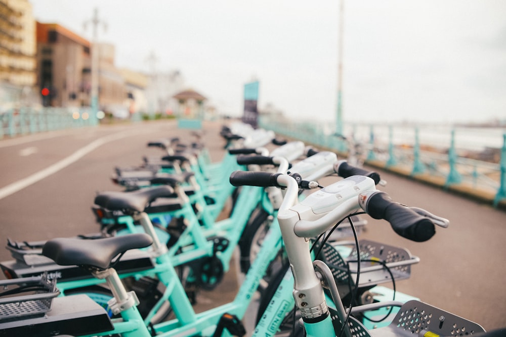 a row of bikes parked next to each other