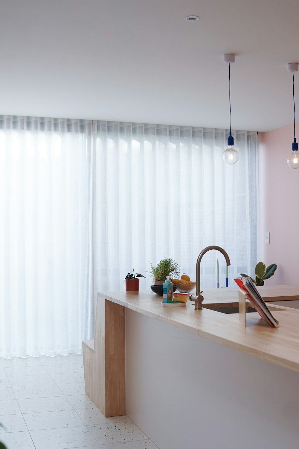 a kitchen with a sink and a window