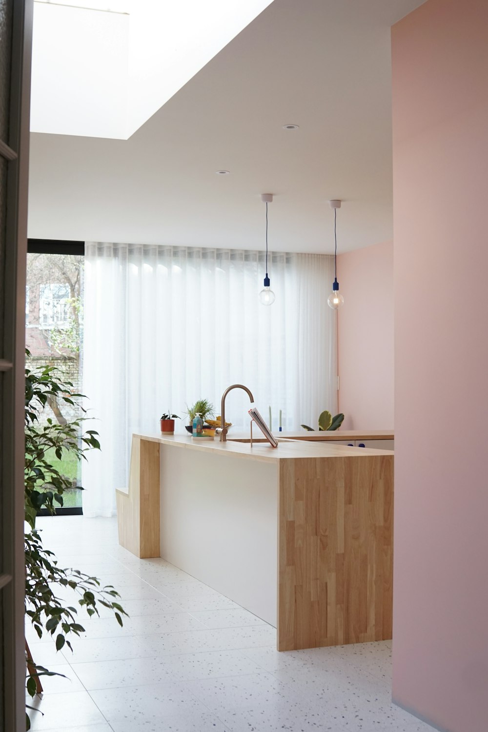 a kitchen with a sink and a window