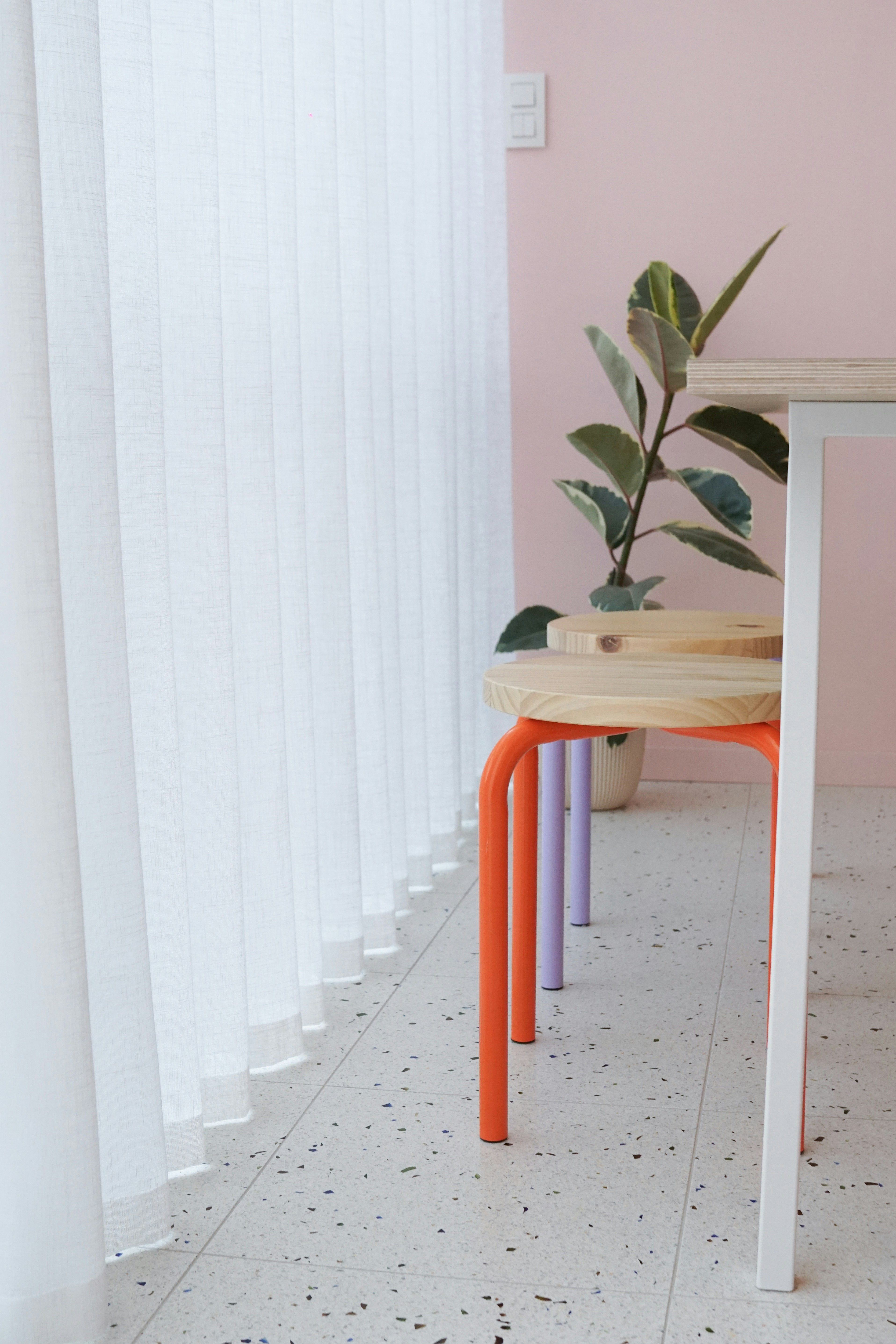 a table with a potted plant on top of it
