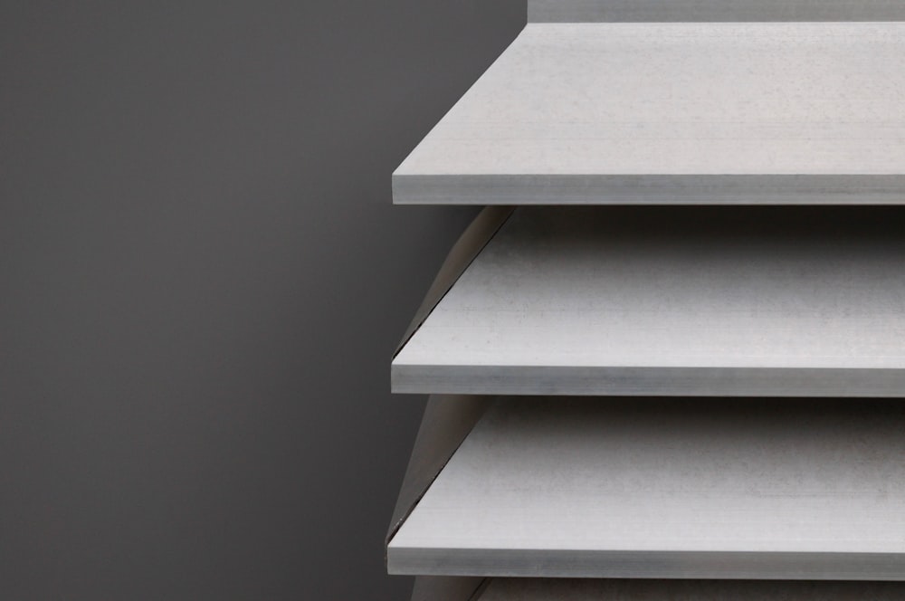 a close up of a stack of shelves on a wall