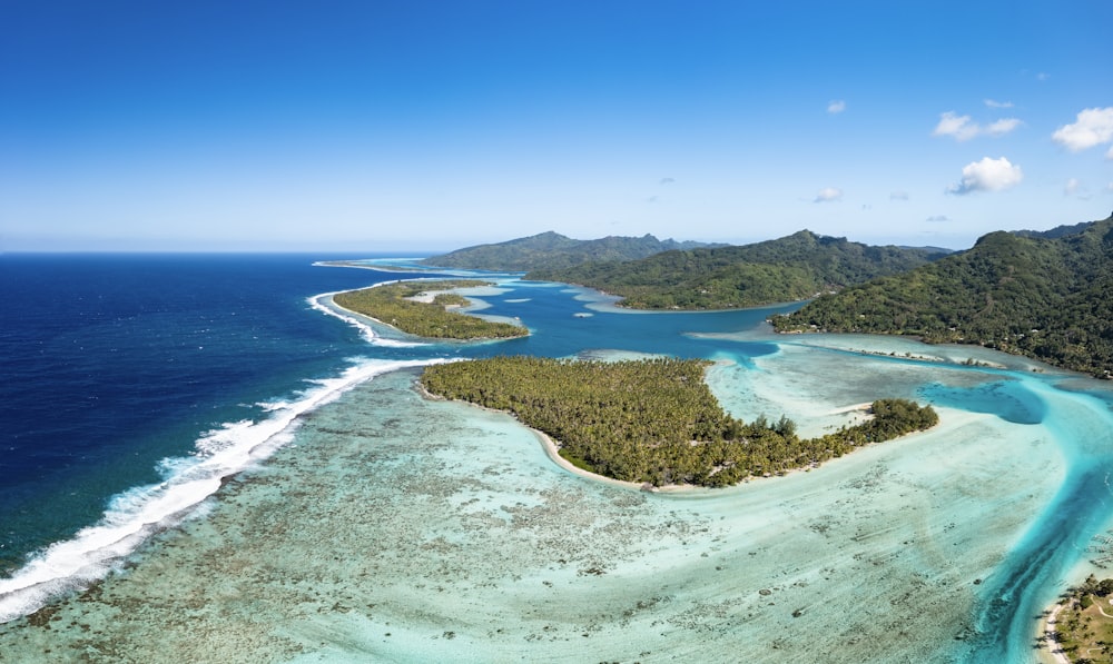 an aerial view of an island in the middle of the ocean