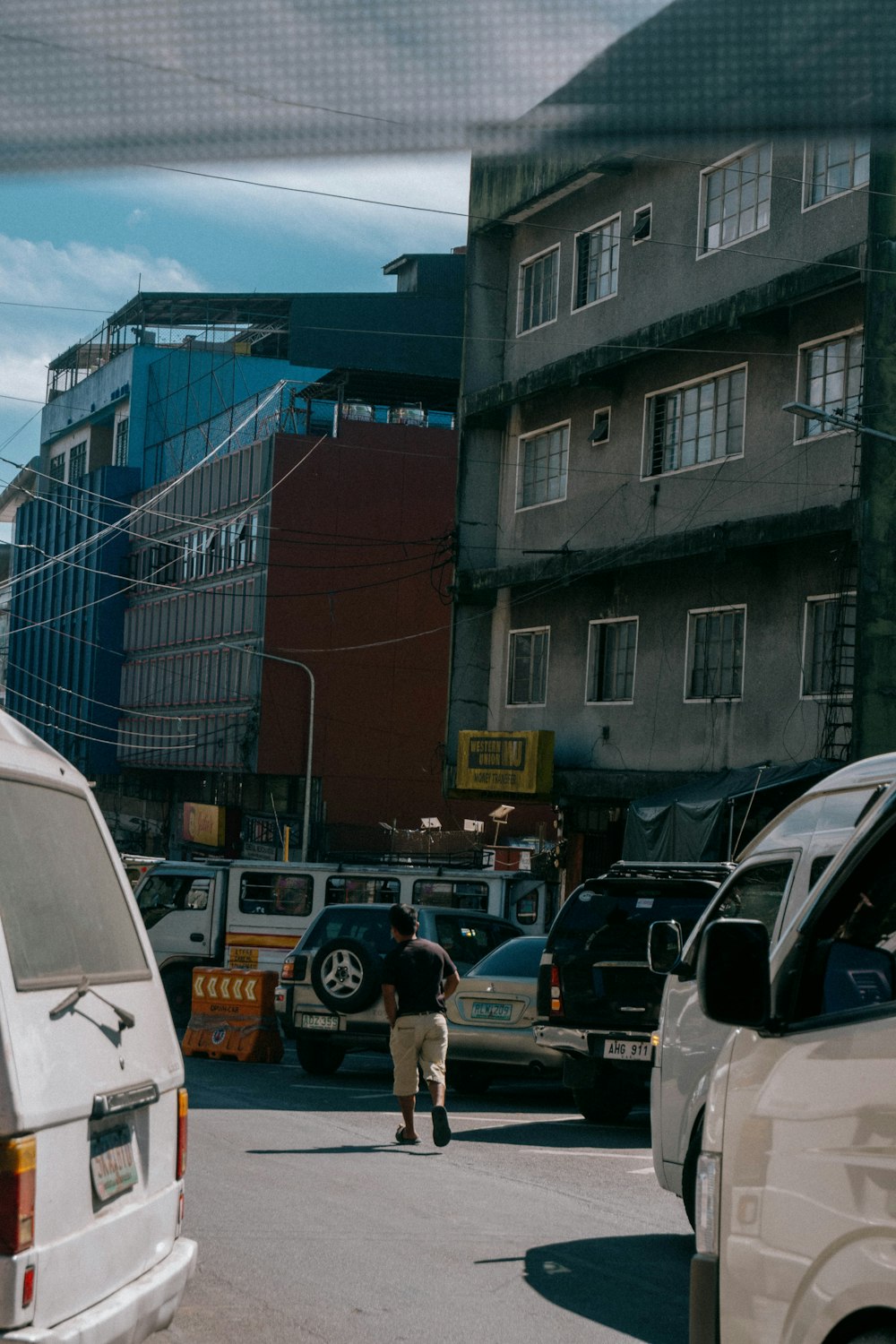 a city street filled with lots of traffic