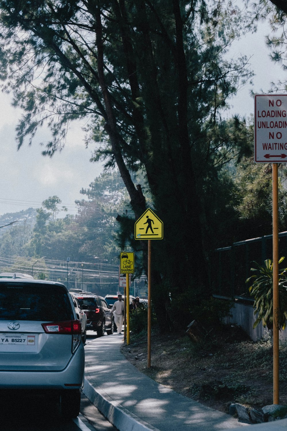 a car is parked on the side of the road