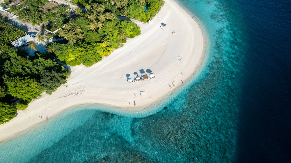 an aerial view of a sandy beach and lagoon