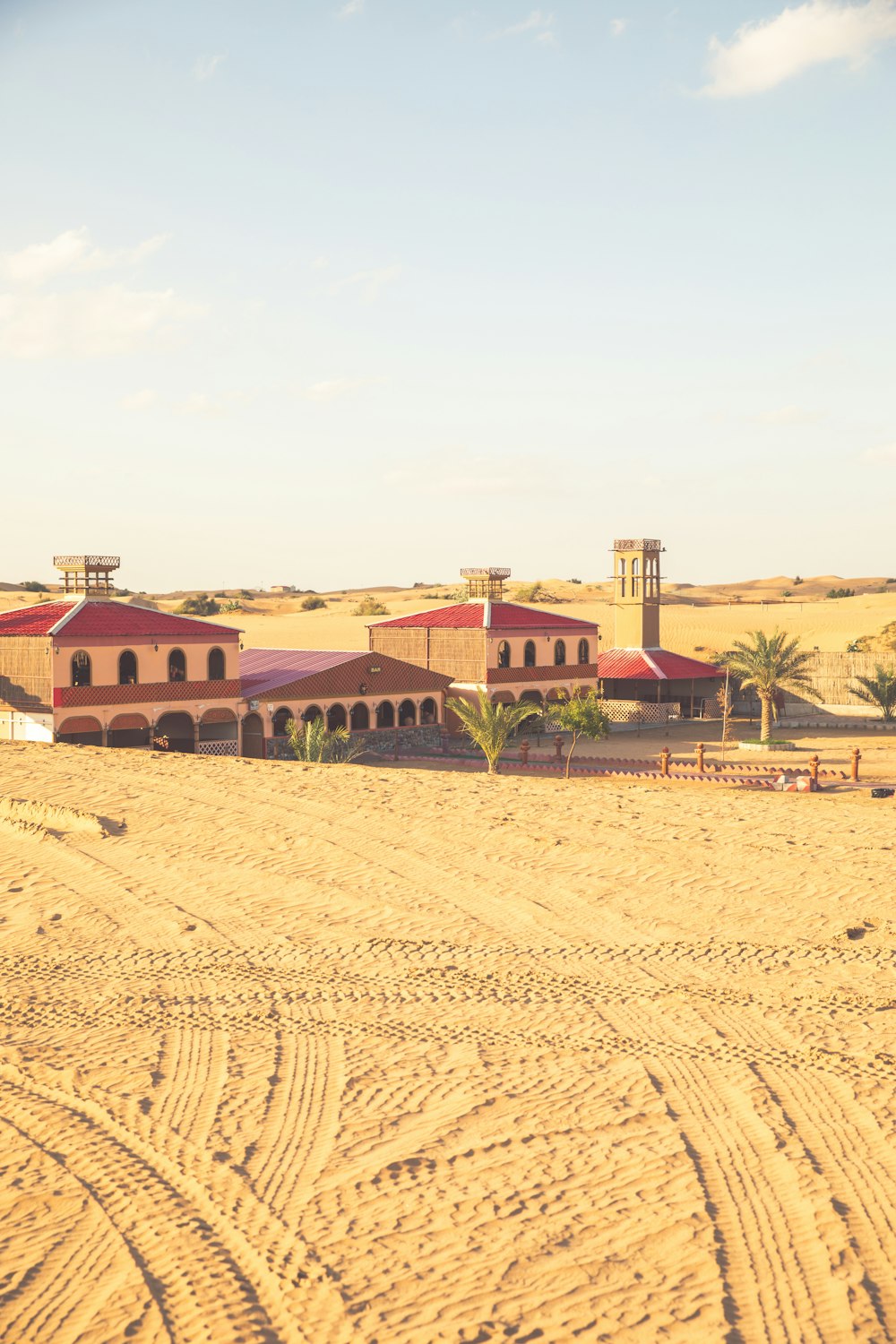 a large building in the middle of a desert