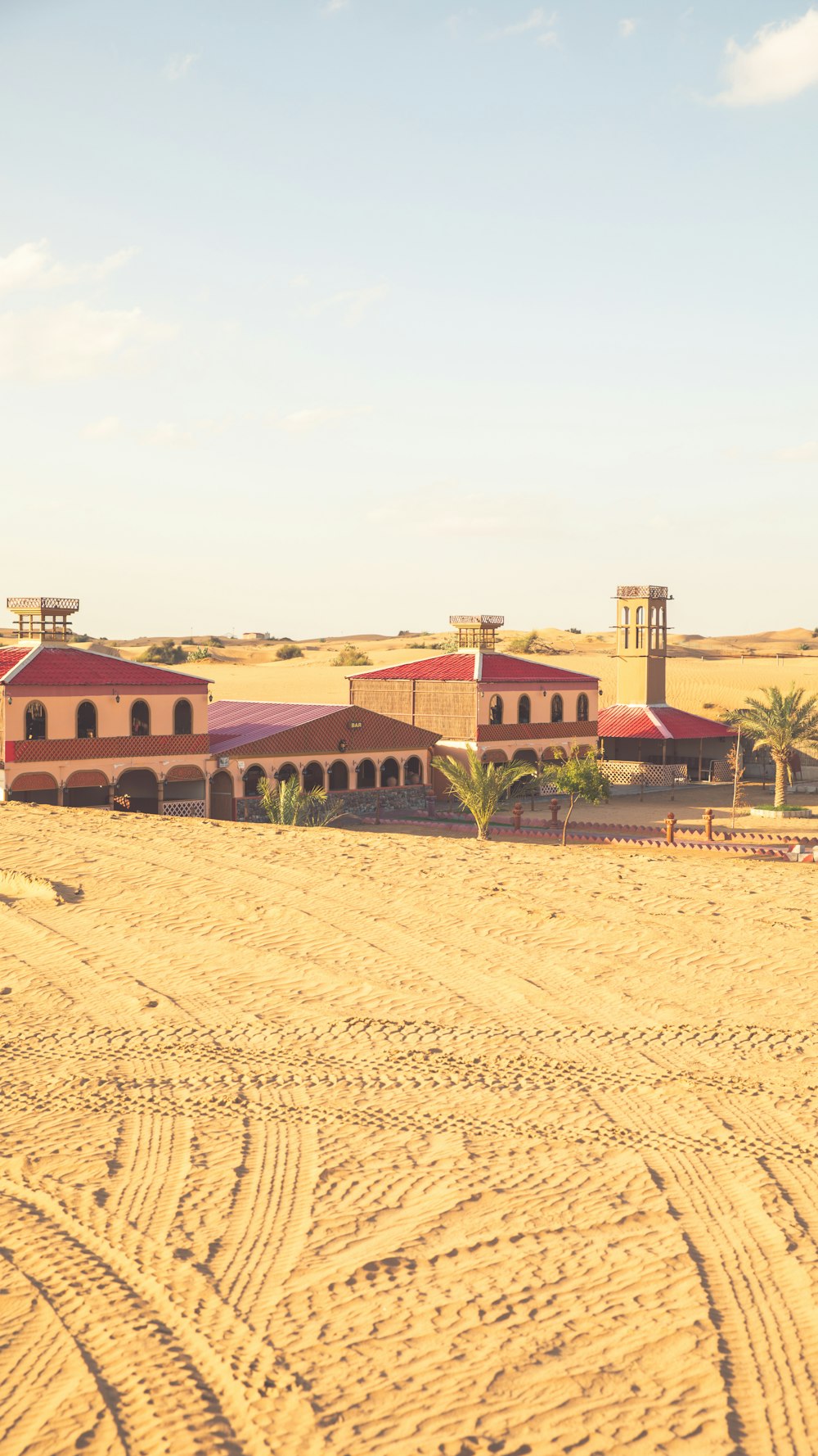 a large building in the middle of a desert