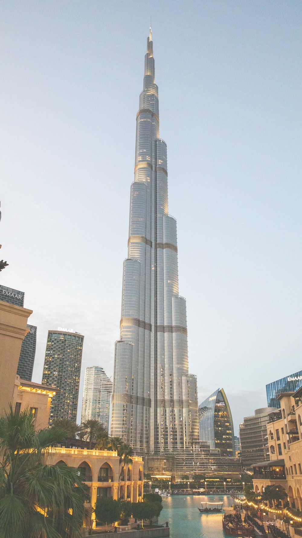 a very tall building towering over a city