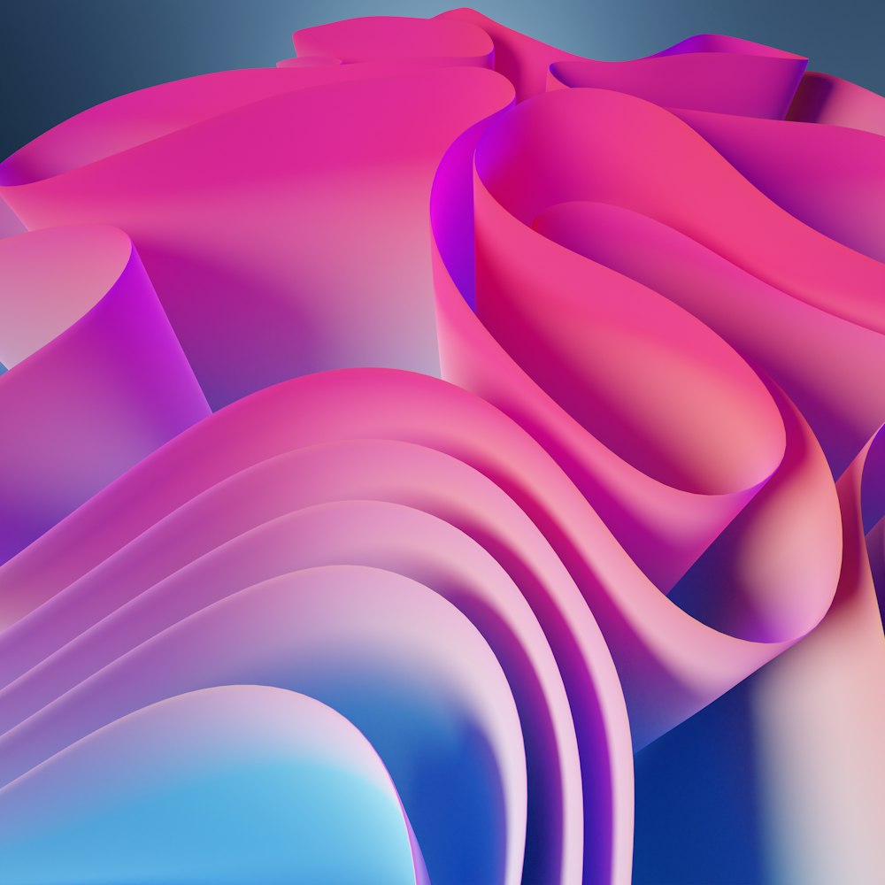 a computer generated image of pink and blue shapes