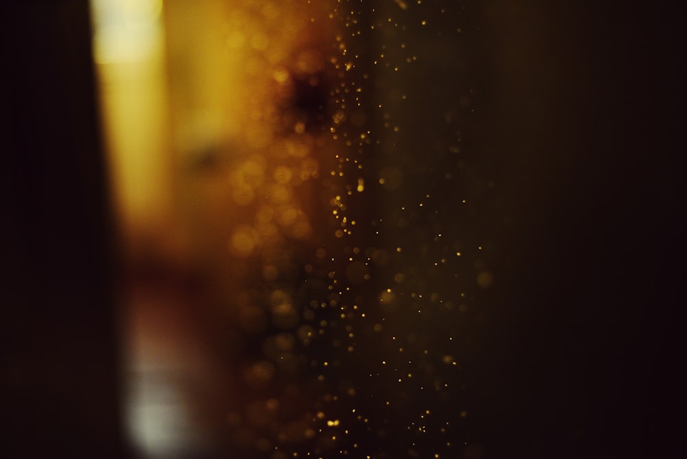 a blurry photo of a wet window