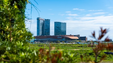 a view of a large building from across a field