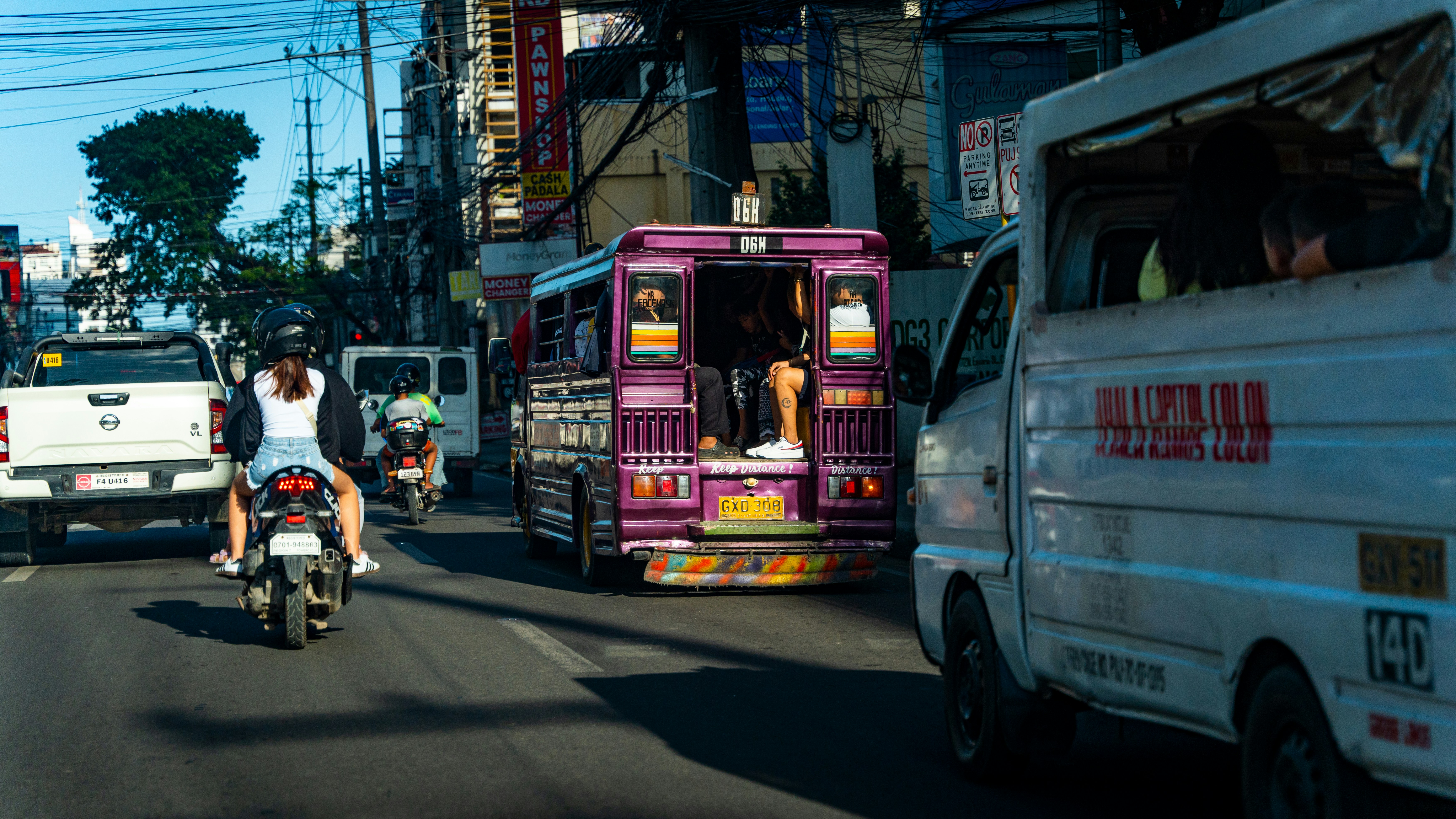 Jeepneys in street traffic in Cebu City, Philippines.