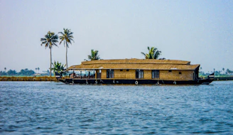 a house boat is floating on the water